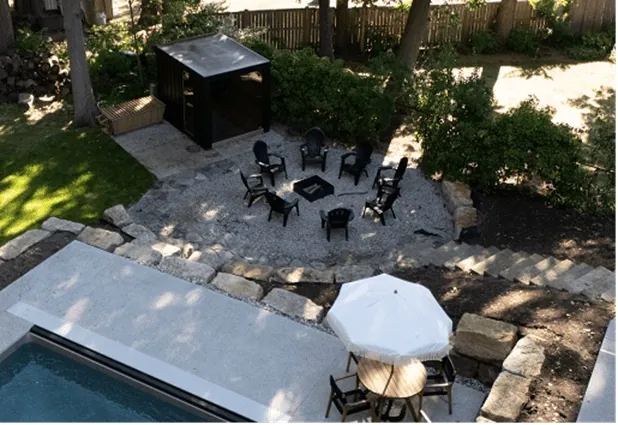 Backyard wellness space with sauna and seating